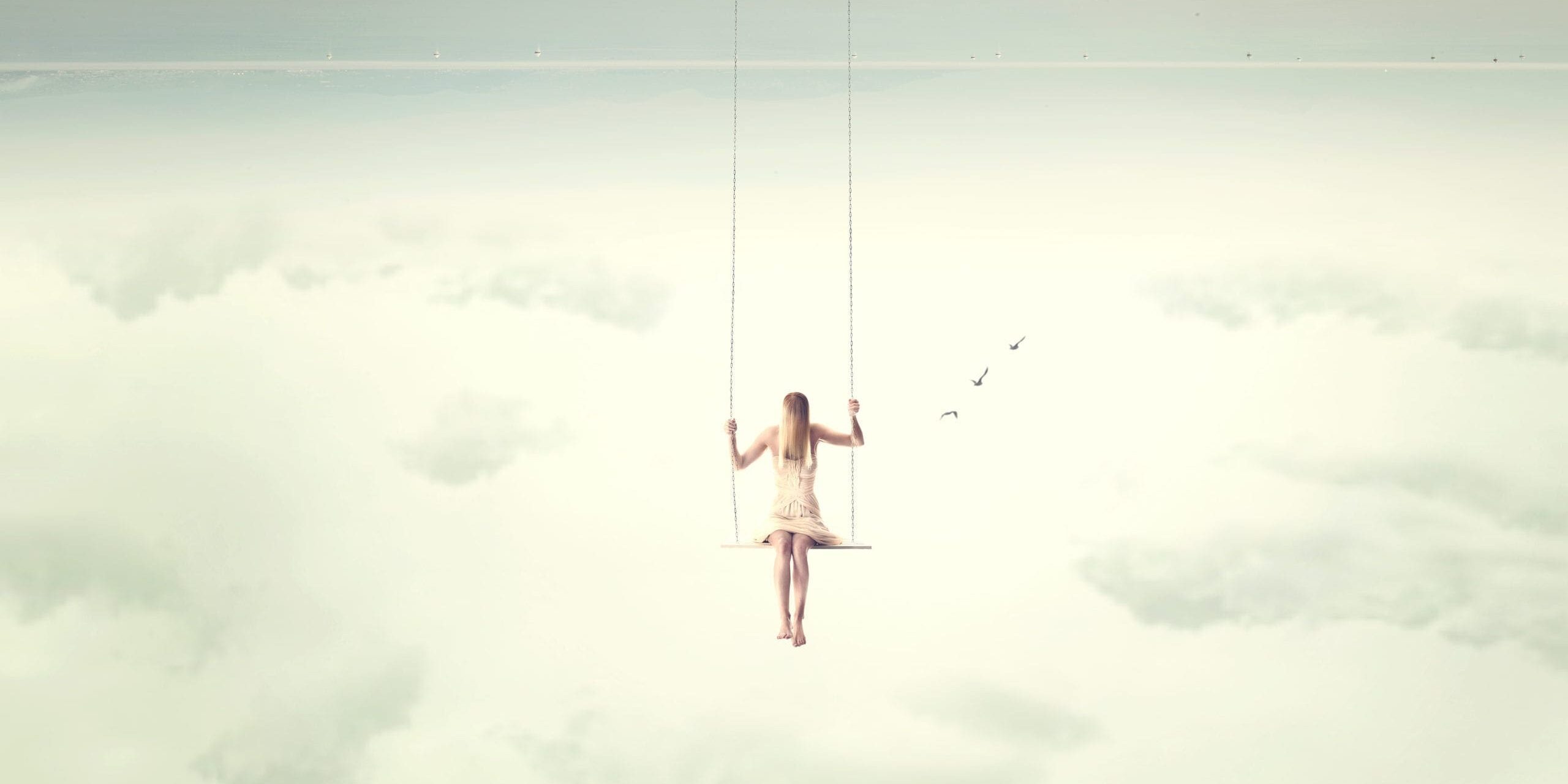 upside down surrealistic minimal woman swings in the air upside down surrealistic minimal woman swings in the air